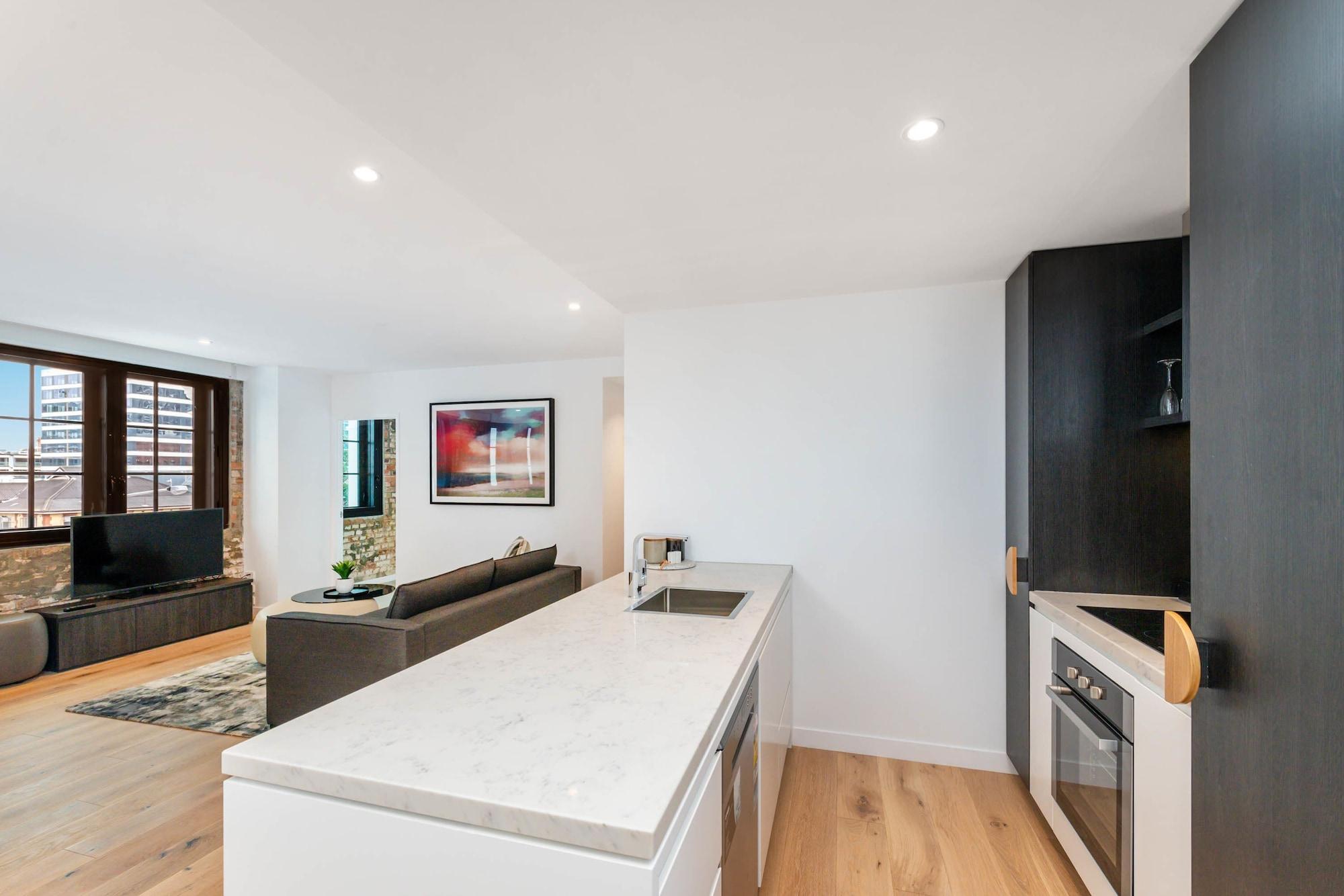 Fv By Peppers Aparthotel Brisbane Eksteriør bilde The kitchen and living area of a typical apartment